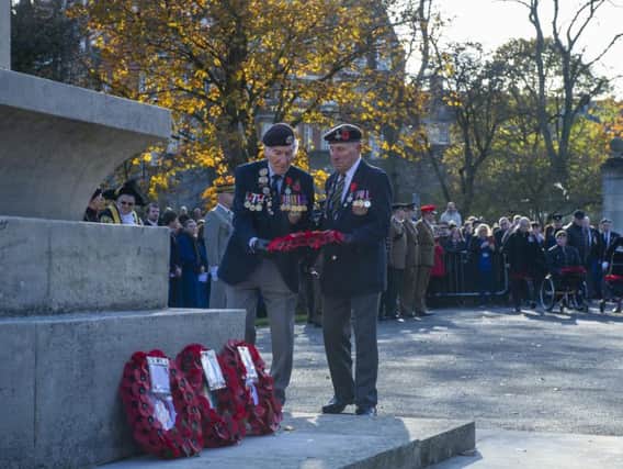 Ninety-four year old veterans Ken Smith and Ken Cook lay a wreath of poppies at the Remembrance Sunday service at York Cenotaph on Leeman Road.   Picture Tony Johnson