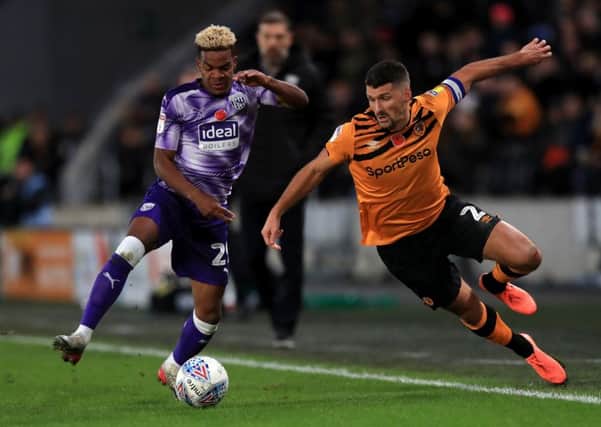 West Bromwich Albion's Grady Diangana (left) and Hull City's Eric Lichaj battle for the ball during the Sky Bet Championship match at the KCOM Stadium, Hull. (Picture: Simon Cooper/PA Wire)