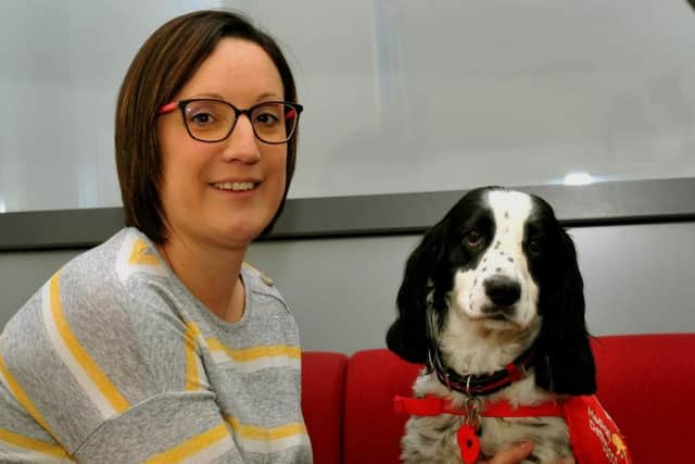 Michelle Sutherland and her pet dog Clive who saves her life on a daily basis