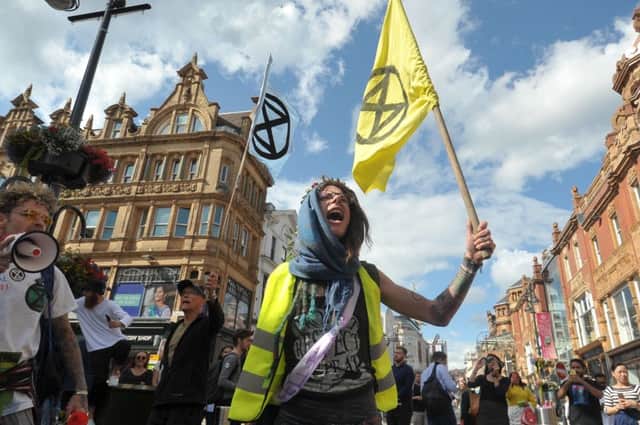 18 July 2019......     Protest group Extinction Rebellion 'die' on Briggate in Leeds  a publicty act  Picture Tony Johnson.