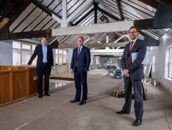From left, Ben Cooper of PPH Commercial, Wykeland Groups John Gouldthorp and Tim Powell of Scotts Property in the top floor of Minster House.