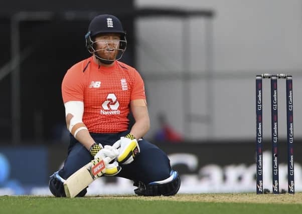 England's Jonny Bairstow reacts while batting against New Zealand during their T20 cricket match at Eden Park, Auckland. (Picture: Andrew Cornaga/Photosport via AP)