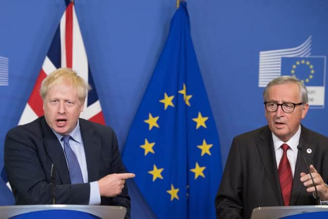 UK Prime Minister Boris Johnson (left) and Jean-Claude Juncker, President of the European Commission, before the general election was called.