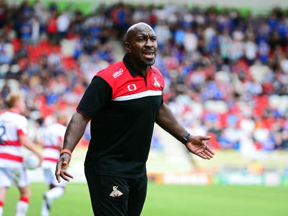 Darren Moore's Doncaster Rovers hope to set up an FA Cup second-round trip to Sunderland or Gillingham