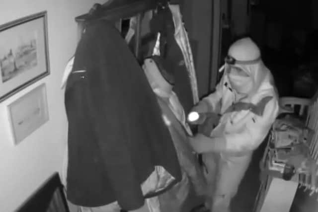 CCTV installed by the victim's relatives captured the thief rifling through the pockets of coats in the hall of his home near Selby