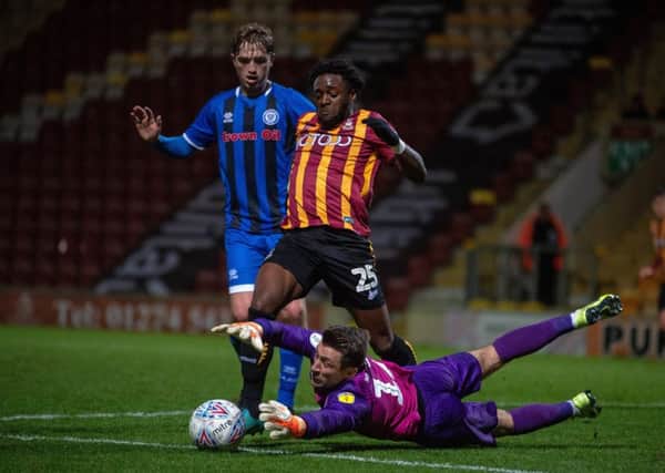 Aramide Oteh and Jay Lynch go for the ball.  Picture Bruce Rollinson