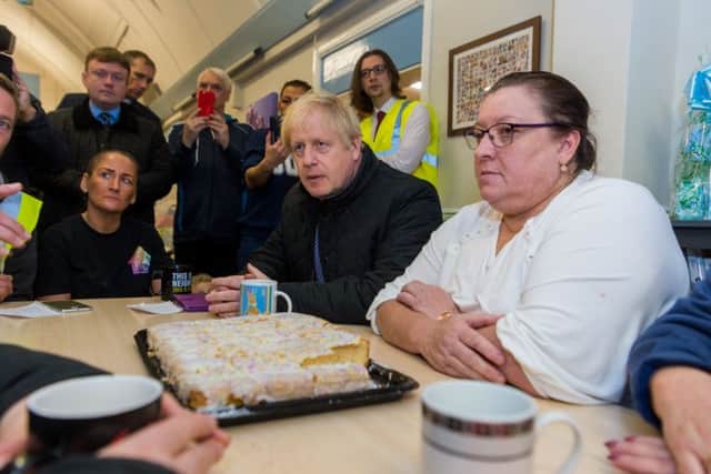 Boris Johnson meets flooding victims during a visit to Stainforth Community Resource Centre.