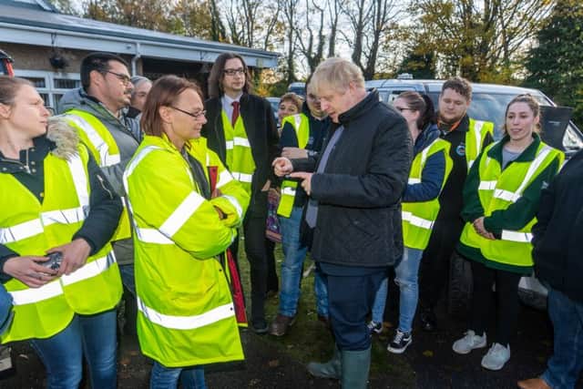 Boris Johnson met volunteers in Stainforth on Wednesday following this month's floods.
