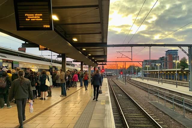 Commuters at Leeds Station and sunset. Pic: Bruce Rollinson