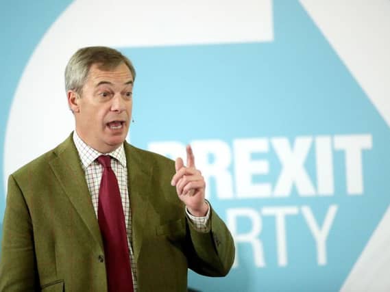 Brexit Party leader Nigel Farage addresses supporters at Ionians RUFC in Hull during General Election campaigning. Pic: PA