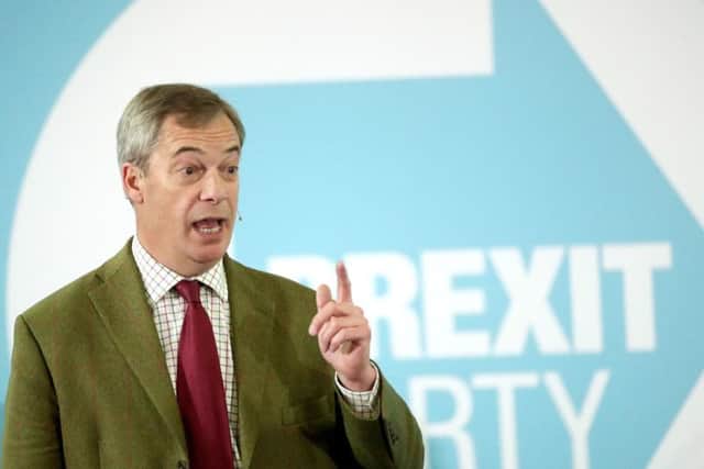 Brexit Party leader Nigel Farage addresses supporters at Ionians RUFC in Hull during General Election campaigning. Pic: PA