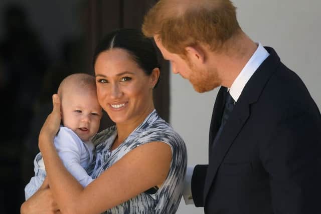 The Duke and Duchess of Sussex hold their son Archie during their recent tour of South Africa.