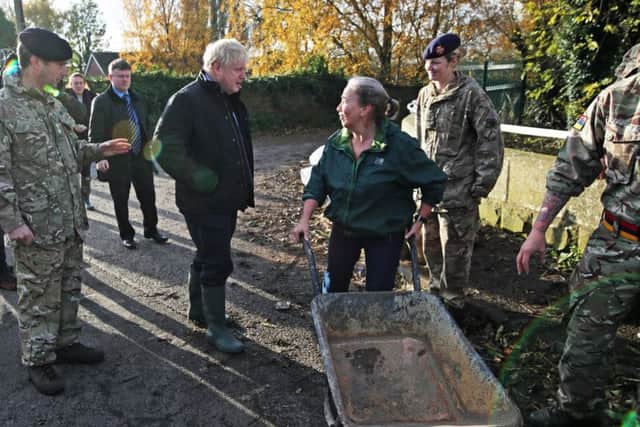 Soldiers assisting the Don Valley flood relief operation were visited by Boris Johnson.