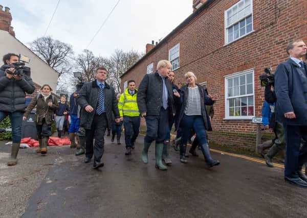 Boris Johnson on a tour of flood-hit Fishlake.