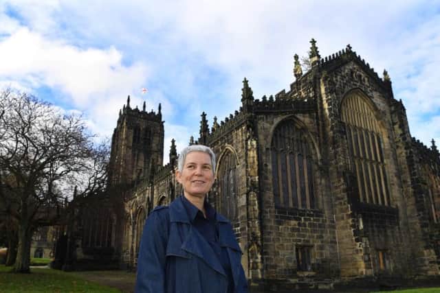 Anne Choma, a historical adviser for Gentleman Jack, outside Halifax Minster, where Anne Lister was baptised and buried.