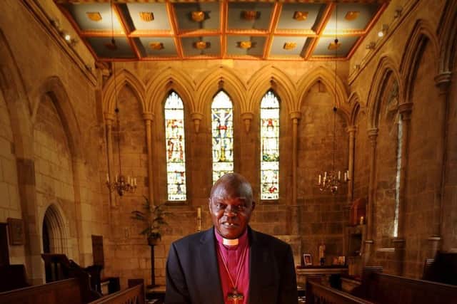 The Archbishop of York Dr John Sentamu lighting candles at Bishopthorpe Palace, in York.