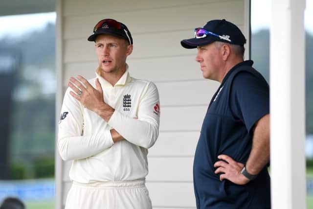England captain Joe Root speaks with coach Chris Silverwood at Cobham Oval. Picture: Gareth Copley/Getty Images