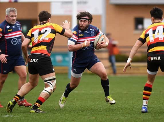 Robin Hislop: Doncaster Knights prop left the field with suspected concussion.