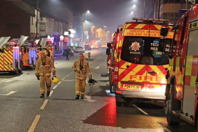 Fire fighters at the scene after a fire on the top floors of a building on Bradshawgate in Bolton. Friday November 15, 2019. Photo credit: Peter Byrne/PA Wire