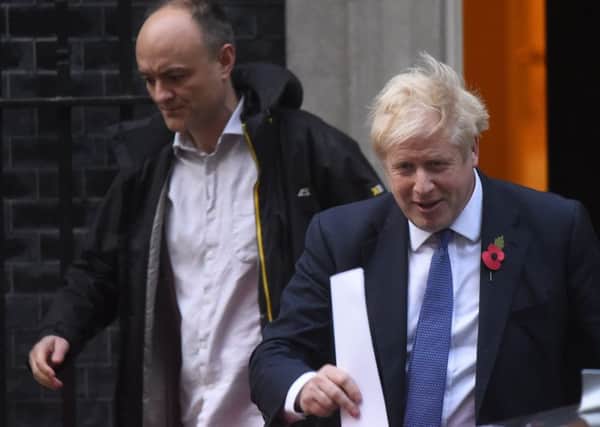 Boris Johnson with his chief of staff Dominic Cummings (left).