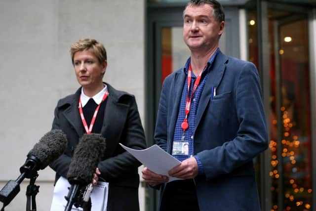 Newsnight journalists Meirion Jones and Liz Mackean (L) deliver a statement to the media outside BBC Broadcasting House on December 19, 2012 after the BBC Trust announced the findings of the Pollard Review into the corporation's handling of sexual abuse allegations against Jimmy Savile.  (Photo by Oli Scarff/Getty Images)