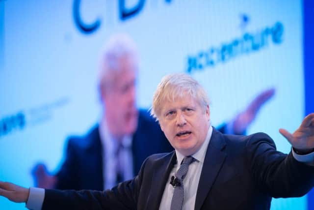 Boris Johnson promised to defer a corporation tax cut when he addressed the CBI.