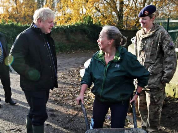 Boris Johnson on a visit to flooded South Yorkshire