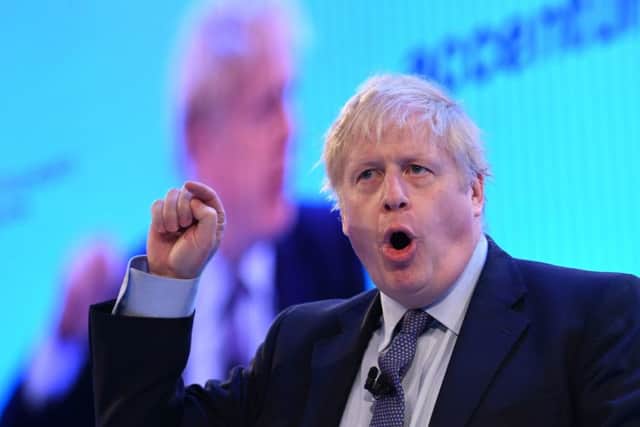 Prime Minister Boris Johnson has put a corporation tax cut on hold.