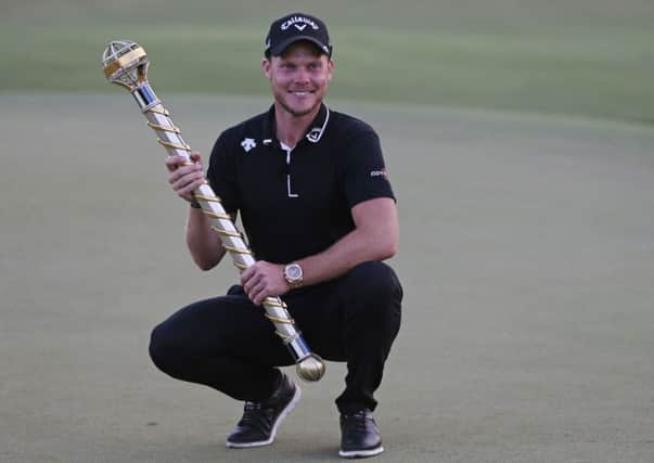 England's Danny Willett poses with the trophy after he won the DP World Tour Championship golf tournament in Dubai (AP Photo/Kamran Jebreili)