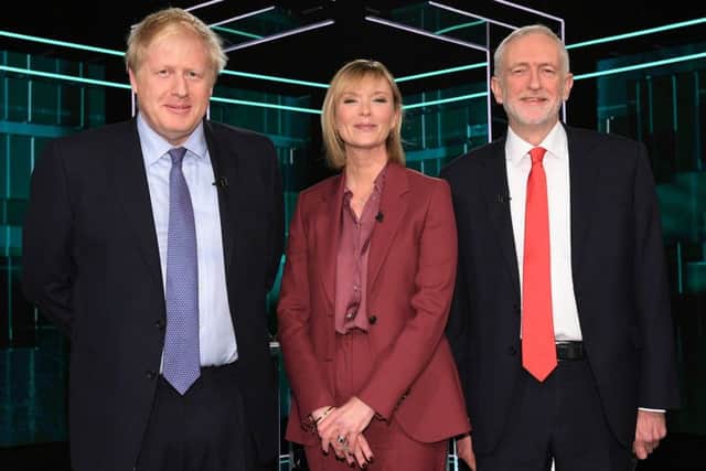 Boris Johnson and Jeremy Corbyn with Julie Etchingham ahead of the ITV debate.
