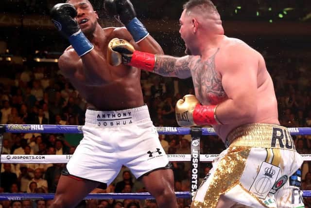 Andy Ruiz Jr (right) lands a punch on Anthony Joshua in the WBA, IBF, WBO and IBO Heavyweight World Championships title fight back in June.