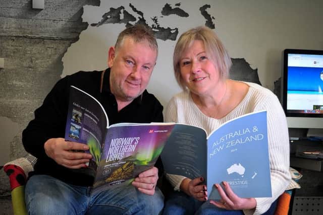 Colman and Rachael Coyne pictured in their travel agents at Huddersfield.Picture by Simon Hulme