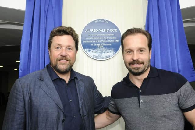 A blue plaque dedicated to Alfie Boe is unveiled by Michael Ball at Marine Hall in Fleetwood