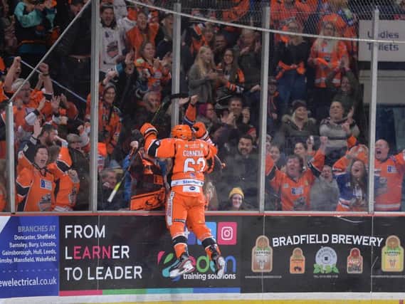 MAGIC MOMENT: Brendan Connolly celebrates his overtime winner against Nottingham with the Sheffield Steelers' fans. Picture: Dean Woolley.