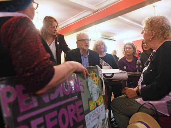 Labour Party leader Jeremy Corbyn speaks with a group of WASPI (Women against state pension inequality) supporters during a visit to the Renishaw Miners Welfare, in Renishaw, Sheffield, whilst on the General Election campaign trail. PA Photo. Photo: Joe Giddens/PA Wire