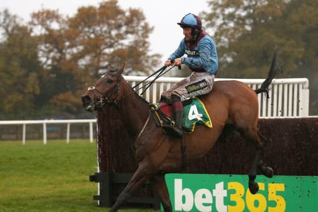 Ballyoptic and Sam Twiston-Davies clear ther last in Wetherby's Charlie Hall Chase,