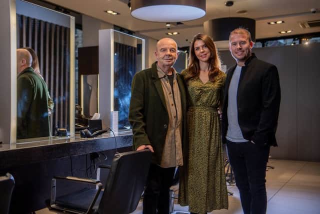 Russell Eaton, owner of Russell Eaton hair salons, at the salon on Boar Lane, Leeds, with son Robert, winner of British Hairdresser of the Year 2019, and daughter Isobel, who won North Eastern Hairdresser of the Year in 2017 and 2018. Picture by James Hardisty.