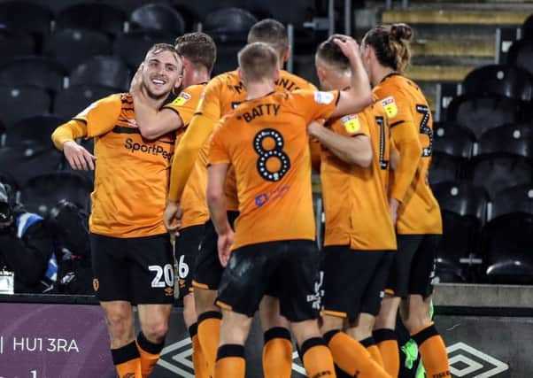 on target: Jarrod Bowen, left, celebrates giving Hull City the lead in their Championship game with Preston last night. (Picture: Danny Lawson/PA)