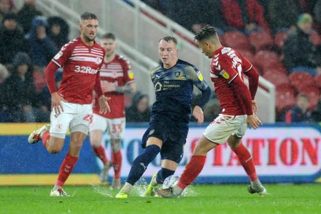 Middlesbrough v Barnsley's Cauley Woodrow is crowded out by the Boro defence. (Picture: Tony Johnson)