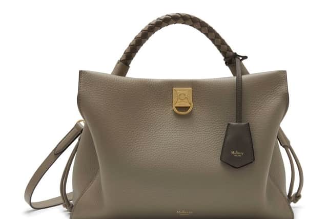 A MULBERRY BAG: The Mulberry Iris shoulder bag is a new contemporary classic with its luxurious soft structure and pull cords to either side, a ladylike silhouette and a choice of a braided top handle in different plaIted shades or a long shoulder strap. The medium is £1,250 and Mulberry has a new shop at Victoria Leeds.
