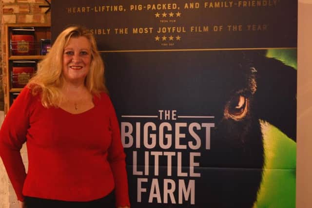 Amanda Atkins in front of the Biggest Little Farm film poster. Picture supplied by PR consultant Sally Brown.