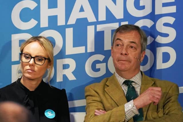 Brexit Party leader Nigel Farage, with the party's Hull West candidate Michelle Dewberry, at One Stop Golf in Hull, East Yorkshire, whist on the General Election campaign trail. Photo: Owen Humphreys/PA Wire
