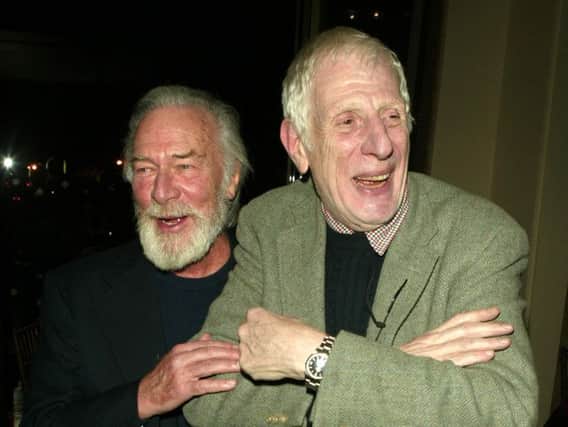 Jonathan Miller, pictured here (right) with Christopher Plummer in 2004. (Gettys)