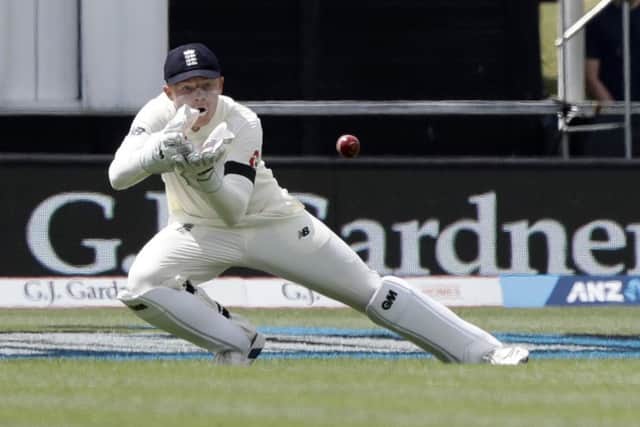 England wicketkeeper Ollie Pope prepares to catch the ball. (AP Photo/Mark Baker)