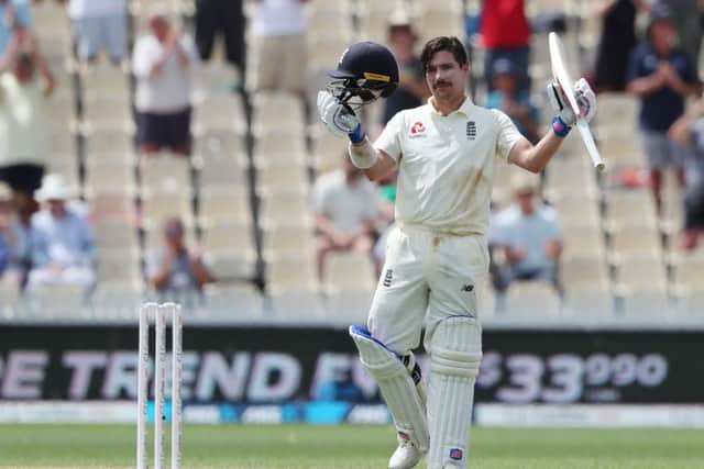 England's Rory Burns celebrates is century at Seddon Park in Hamilton. Picture: Michael Bradley/Getty Images