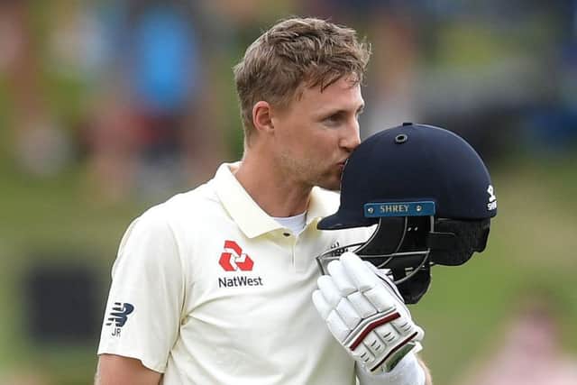 WELCOME KNOCK: England captain Joe Root celebrates reaching his century against New Zealand on day three in Hamilton. Picture: Gareth Copley/Getty Images