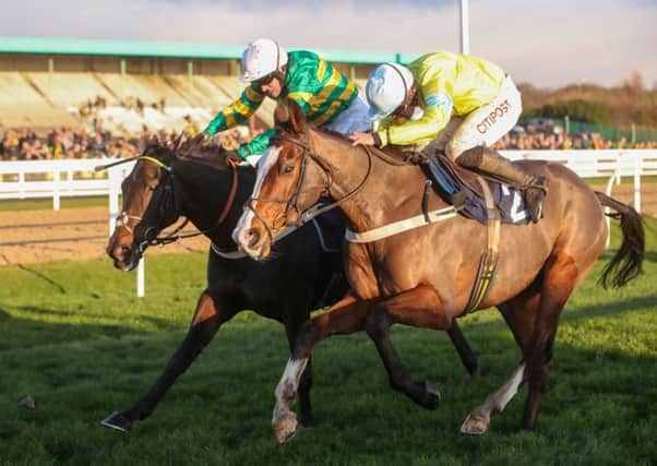 Cornerstone Lad and Henry Brooke, right, hold off Buveau D'Air and Barry Geraghty to win the Fighting Fifth at Newcastle on Saturday. Picture supplied by Grossick Racing