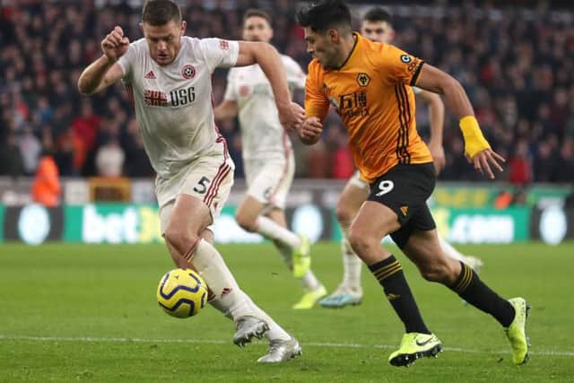 Sheffield United's Jack O'Connell (left) and Wolverhampton Wanderers's Raul Jimenez battle for the ball (Picture: PA)