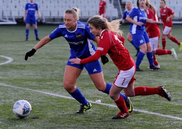 Darcie Greene of Barnsley Women takes on Isabel Sullivan of Sheffield during the Women's FA Cup second-round tie on Sunday (Picture: Steve Riding)