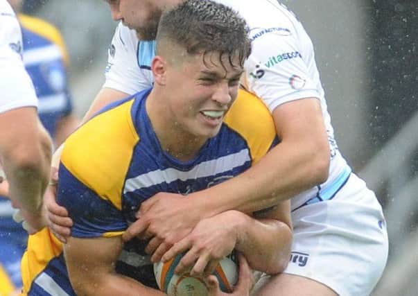 Dan Lancaster - and his teenage peers - earned praise from Yorkshire Carnegie's director of rugby, Martyn Wood, for the way they handled themselves against London Scottish.